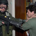 8-FOTO-ELIAN-AGENTE-FEDERAL-VE-AL-FOTOGRAFO