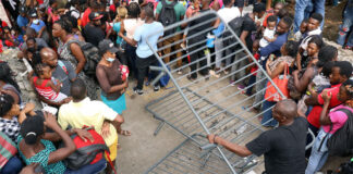 Miles de migrantes protestan para exigir asilo en la frontera sur de México