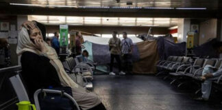 Brasil traslada a afganos acampados en un aeropuerto una semana después del brote de sarna