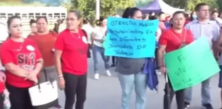 Operadores de maquila protestan y exigen pago de prestaciones en Choloma