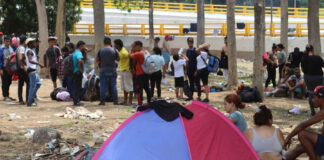 Migrantes en la frontera México con EEUU esperan las mejoras prometidas por Sheinbaum